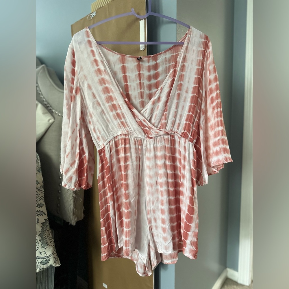 Long sleeve romper. Only tried on.